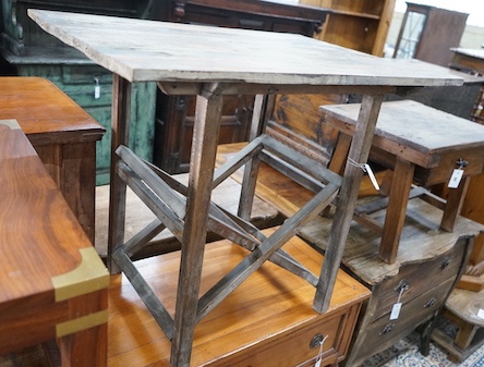 A provincial rectangular pine occasional table on folding stand, width 86cm, depth 63cm, height 73cm